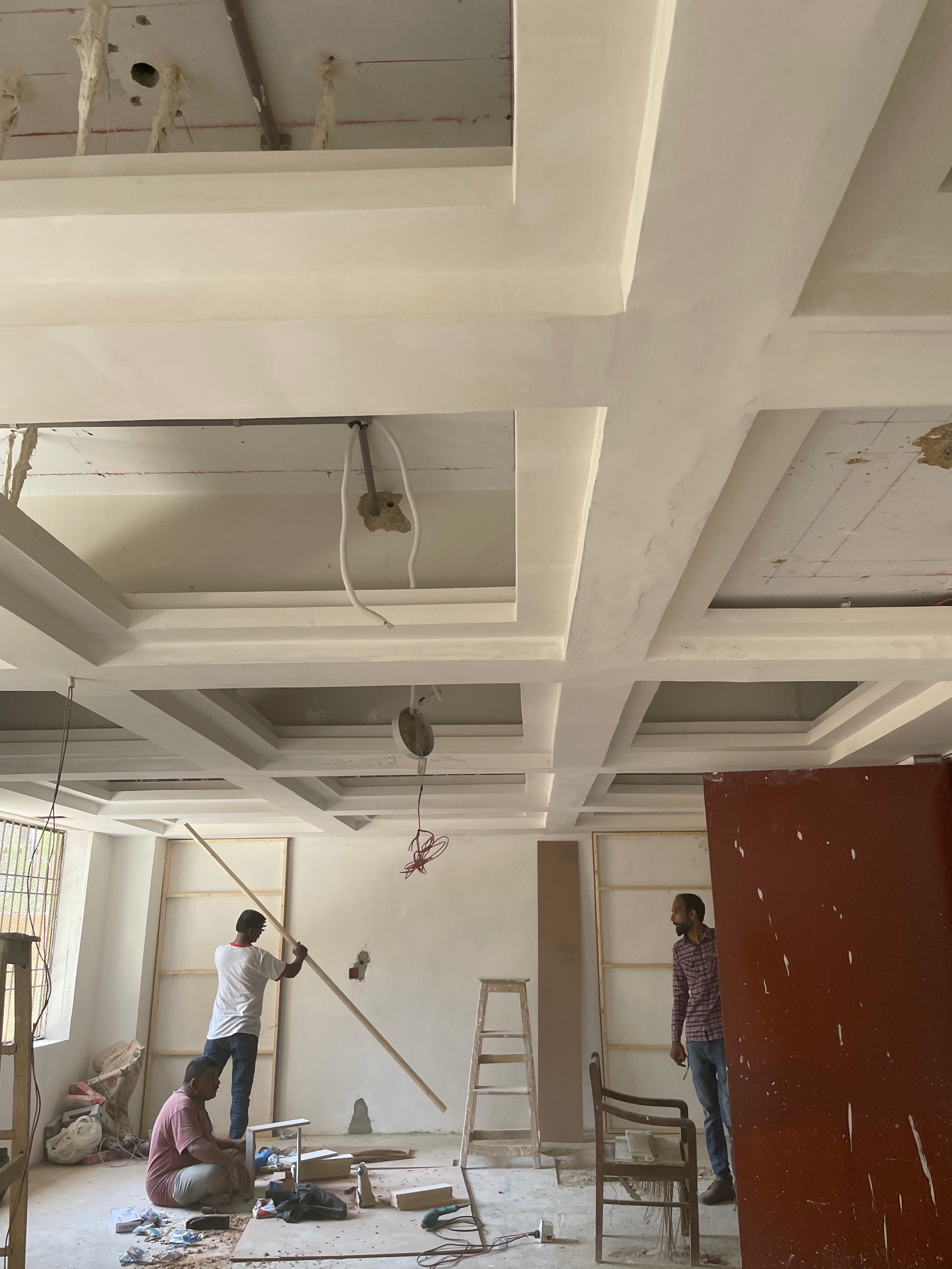 Coffered ceiling and panelling framework under construction